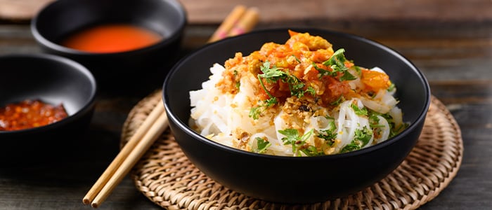 Chopstick next to an asian dish