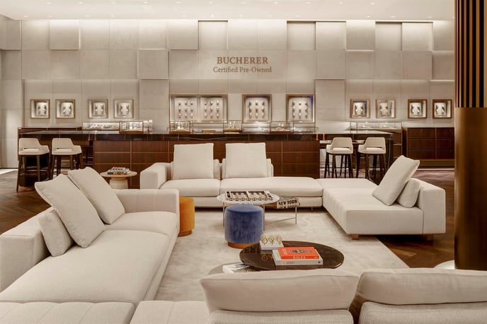 A comfortable aesthetic seating area within a luxury store