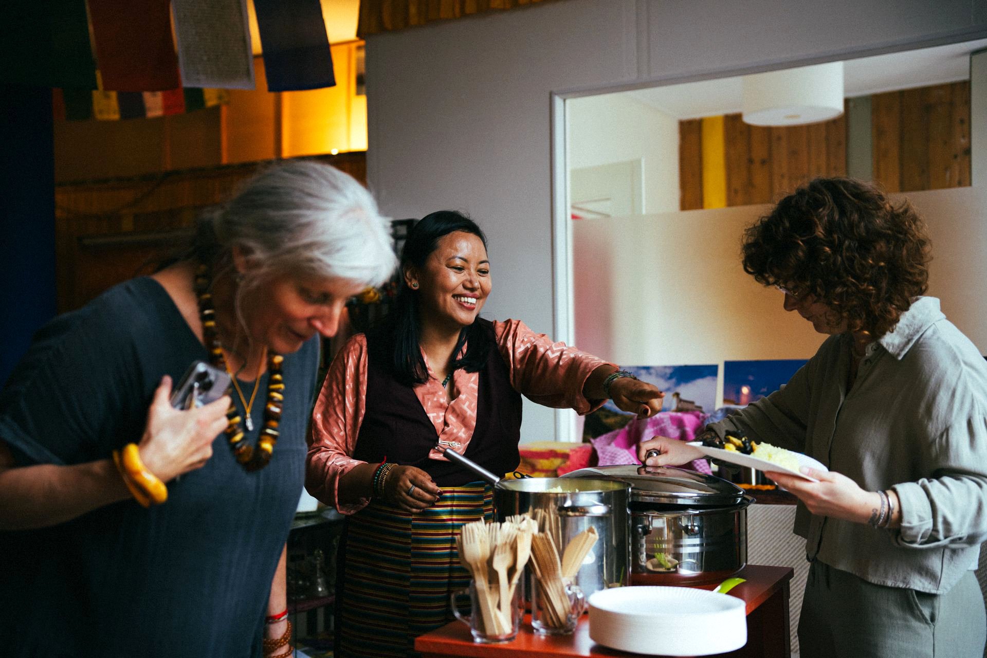 Diverse guests enjoying a buffet