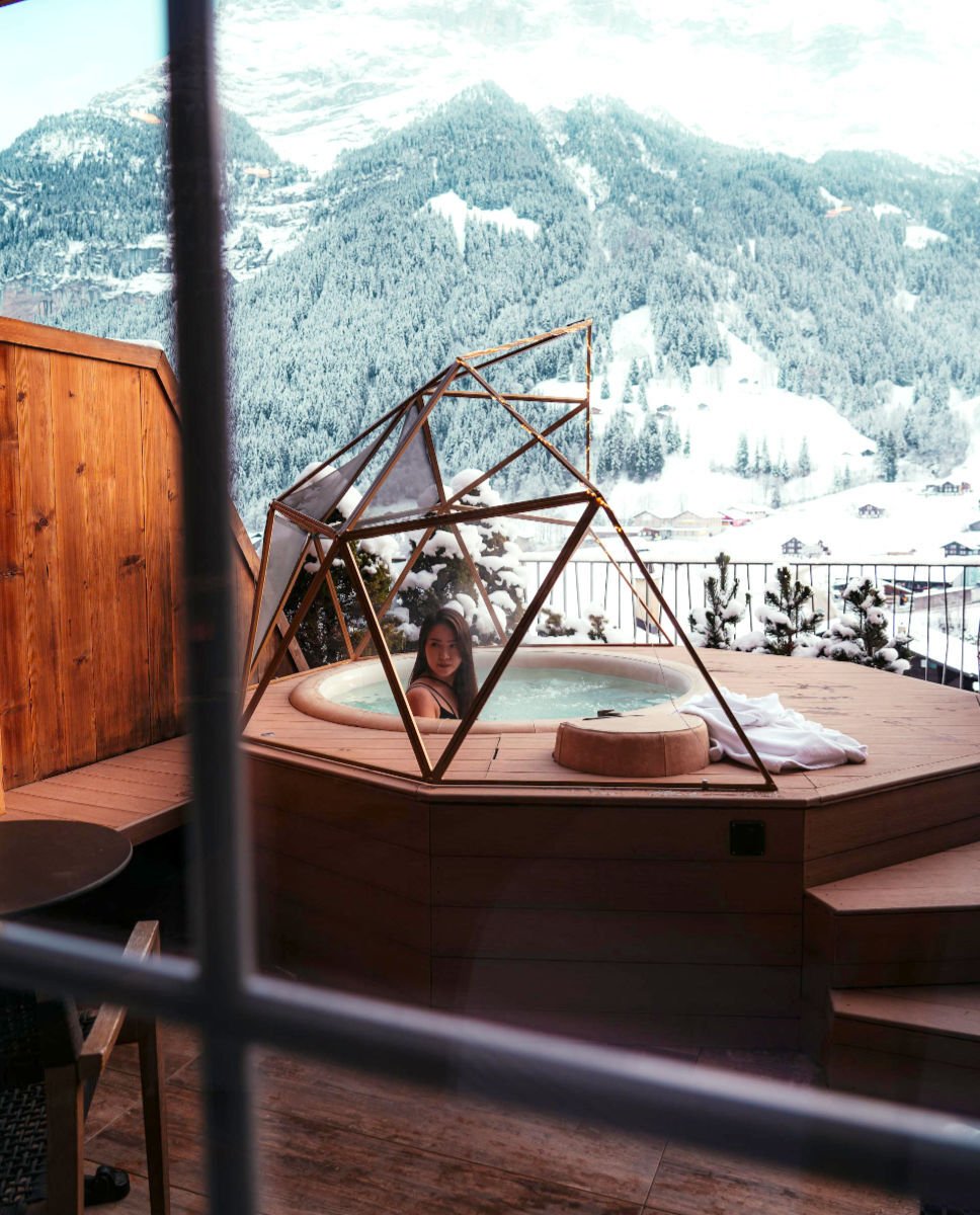 Hot tub in a balcony in Switzerland with excellent mountain views