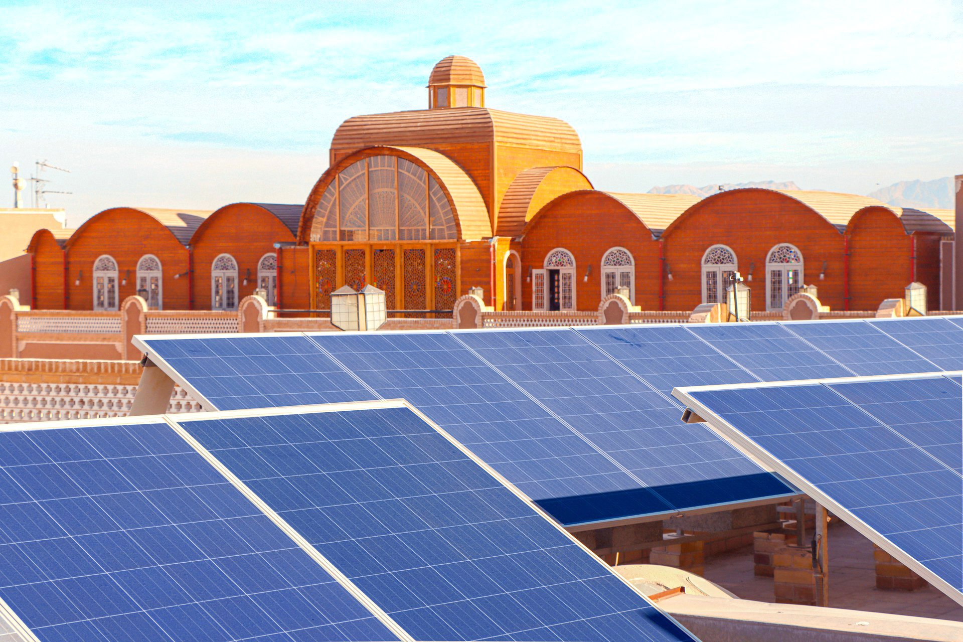 Solar panels installed on the roof of a hotel