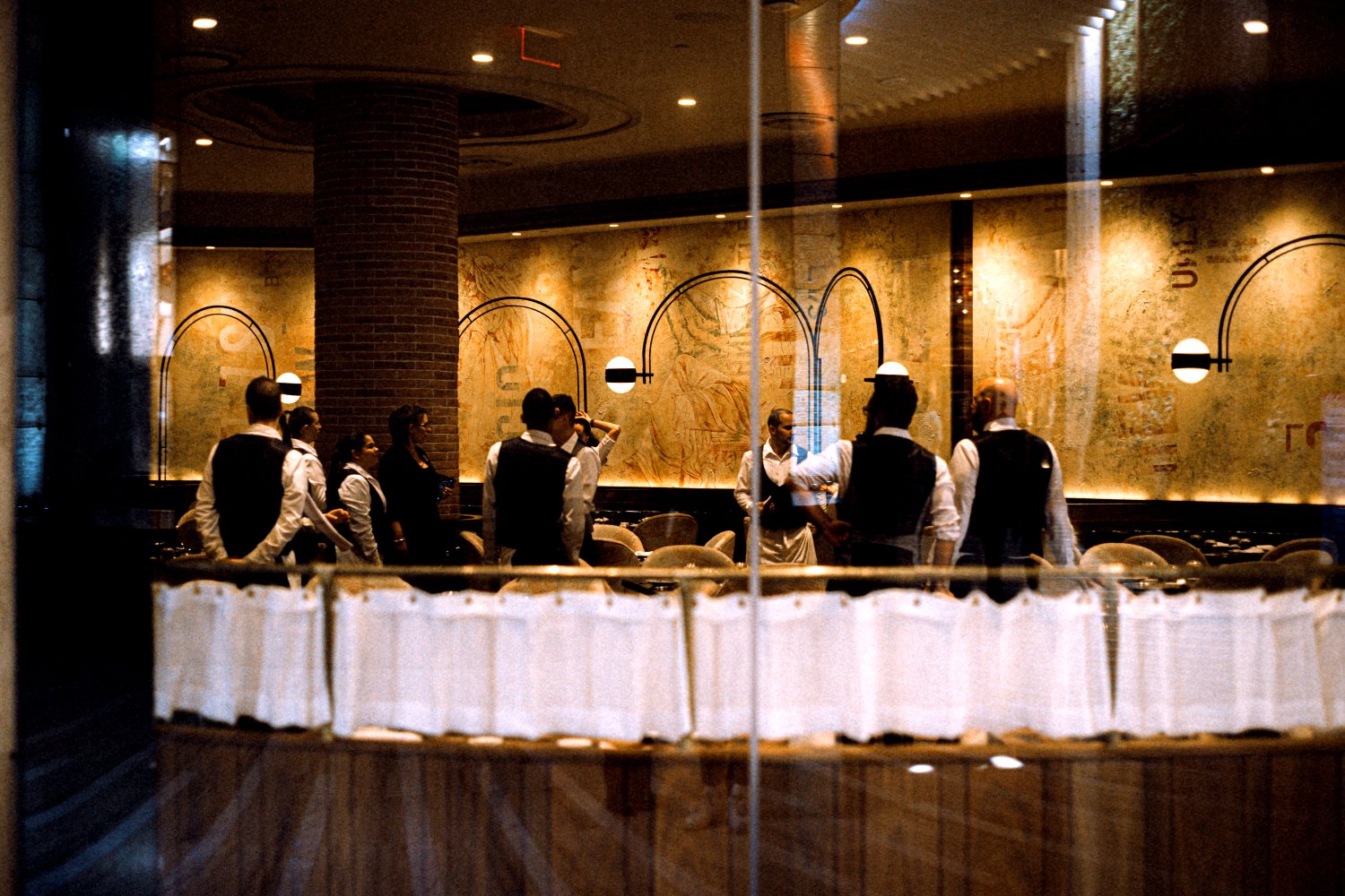 Hotel staff huddle